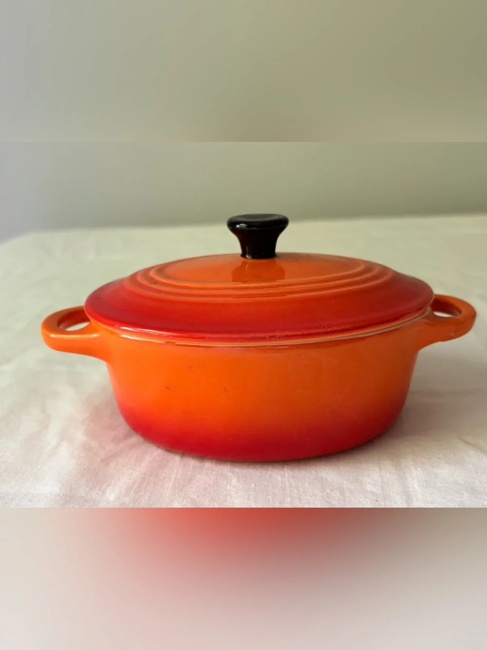 Orange Gradient Ceramic Dutch Oven with Black Knob